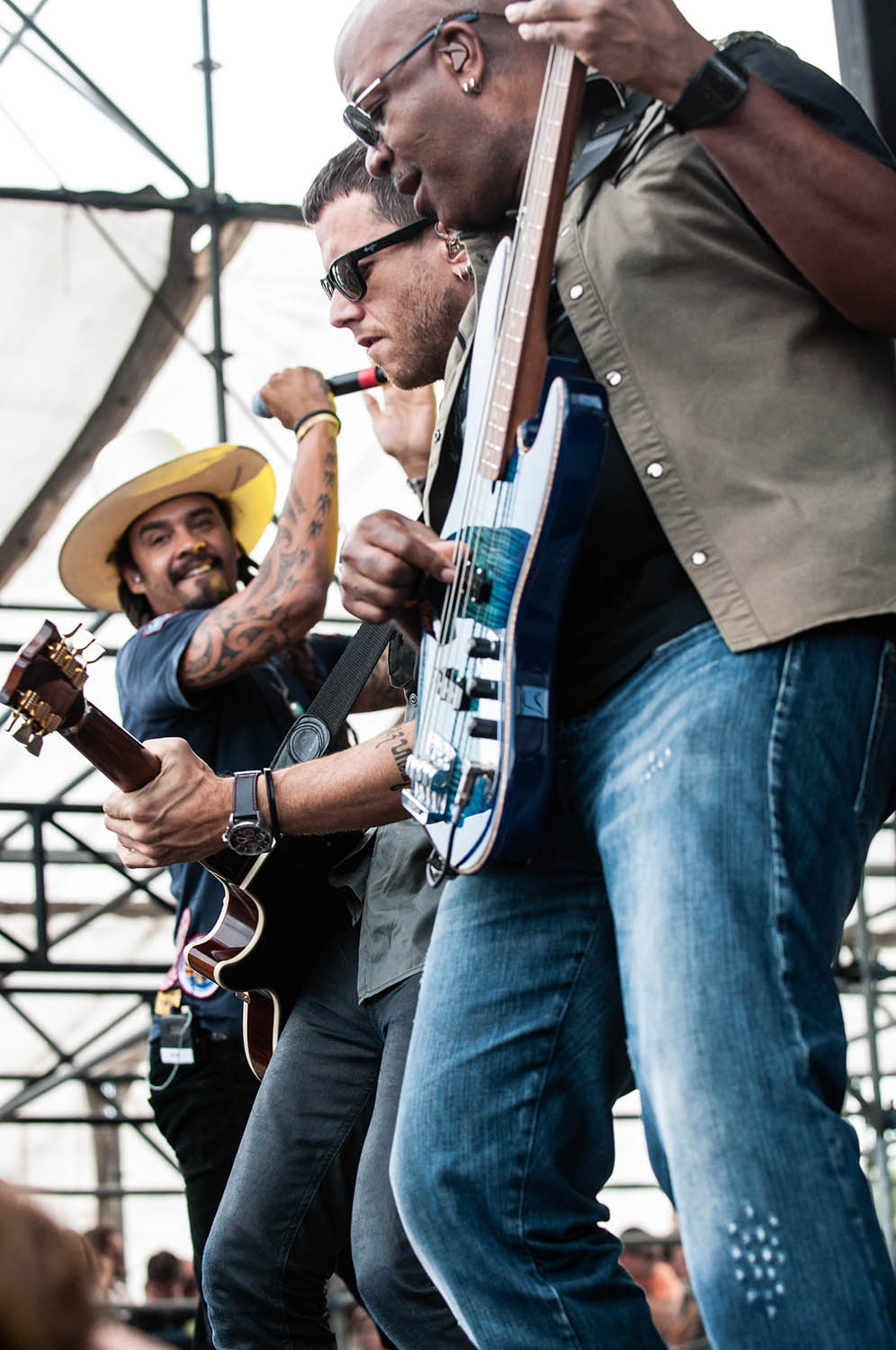 Michael Franti performing with his band